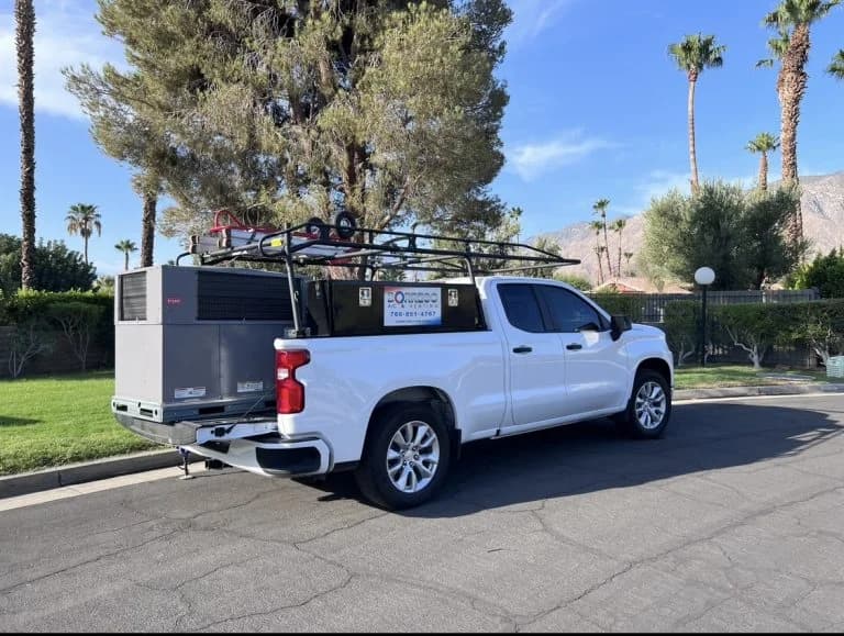 Borrego truck delivering new HVAC unit